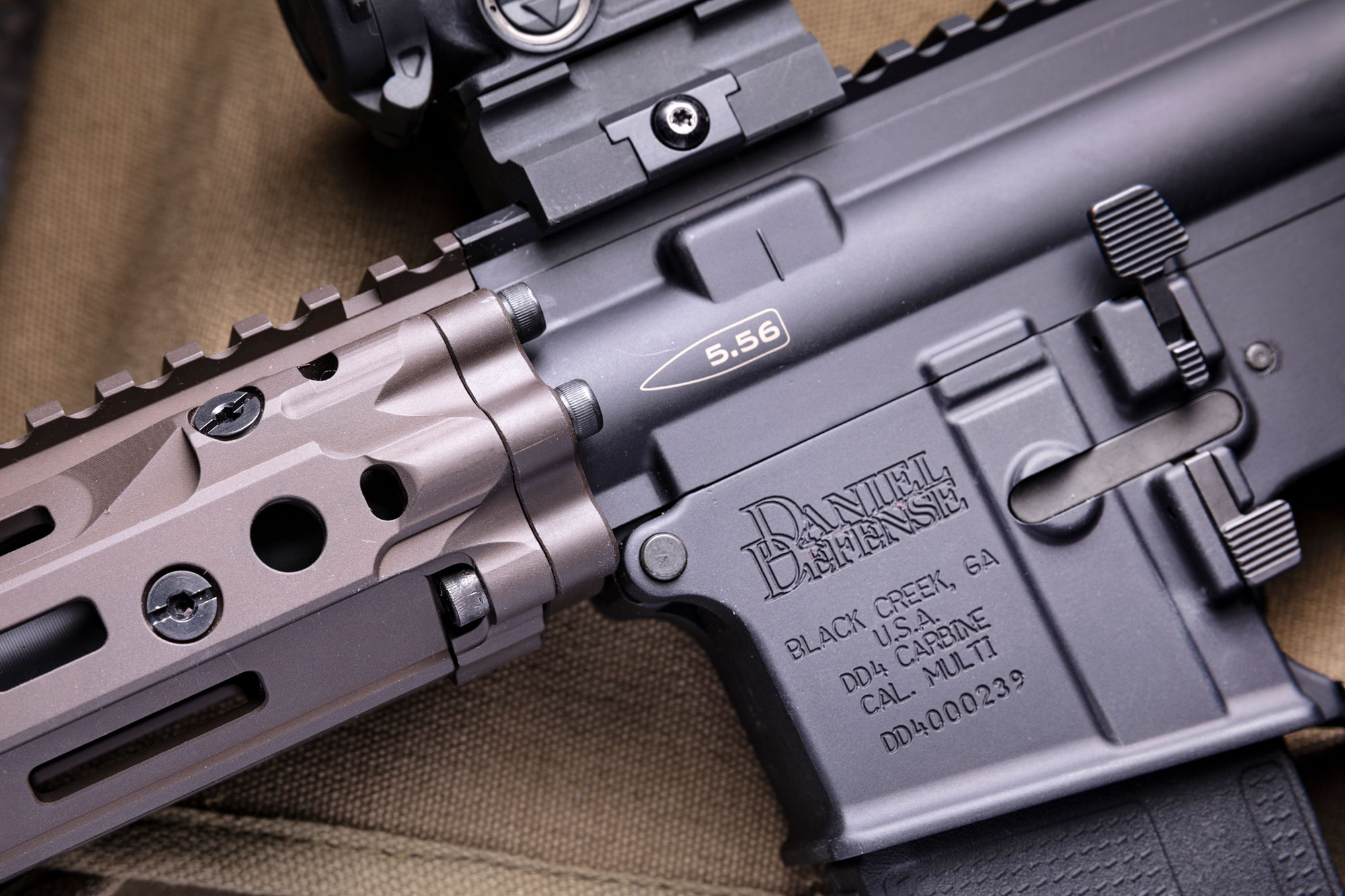 DD's "bolt up" system uses six bolts to rigidly attach the RIS III handguard to the mounting plate sandwiched between receiver and barrel nut.