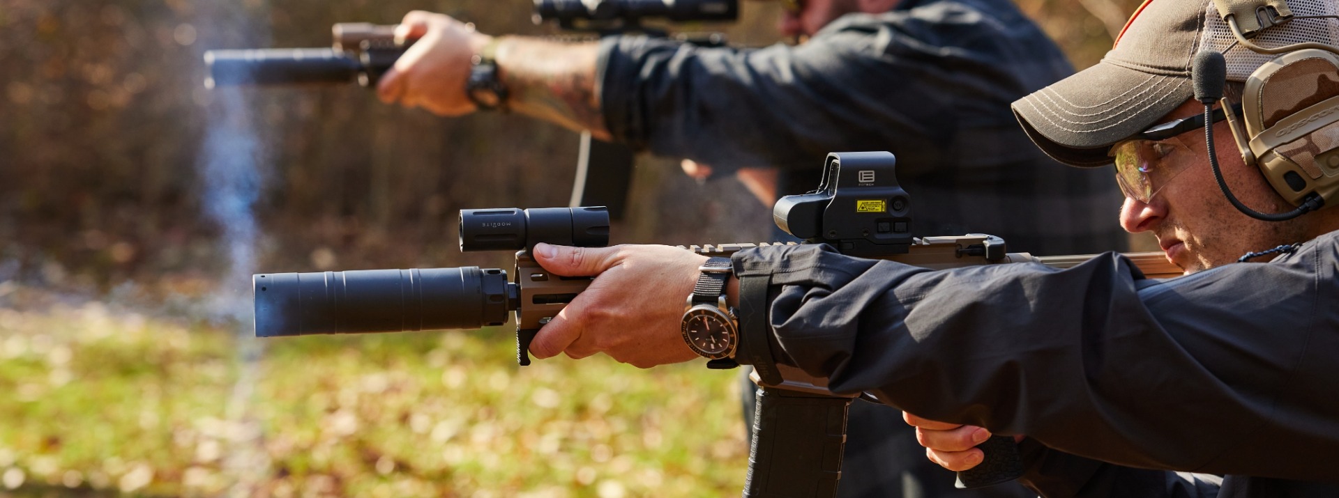 Man firing a Daniel Defense AR-15 style rifle